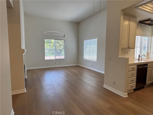 28741 La Triana, Laguna Niguel, CA 92677 - kitchen featuring dishwashing machine, dark wood-type flooring, and light countertops