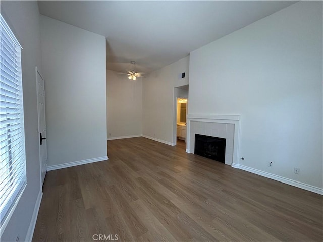 28741 La Triana, Laguna Niguel, CA 92677 - unfurnished living room with dark wood finished floors, ceiling fan, and a tile fireplace
