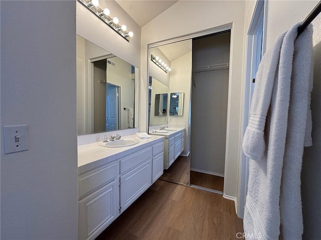 28741 La Triana, Laguna Niguel, CA 92677 - bathroom with wood finished floors, lofted ceiling, and vanity