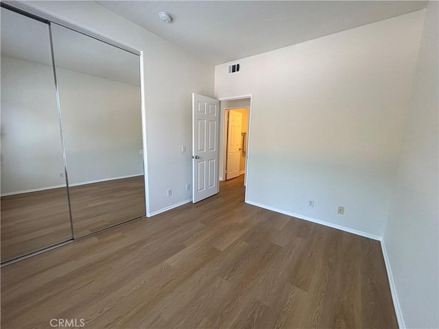 28741 La Triana, Laguna Niguel, CA 92677 - unfurnished bedroom with wood finished floors and a closet
