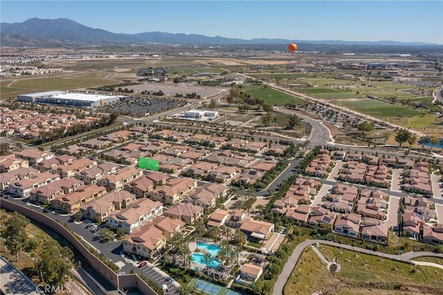 227 Carlow, Irvine, CA 92618 - aerial view of property and surrounding area with nearby suburban area and a mountain backdrop