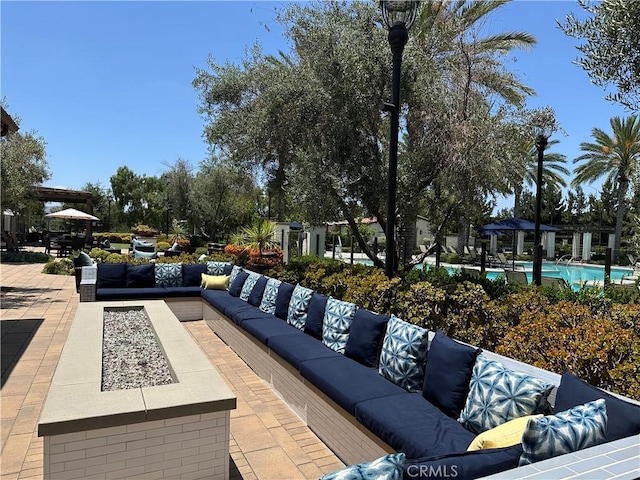 227 Carlow, Irvine, CA 92618 - view of patio with an outdoor hangout area and a community pool