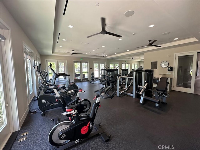 227 Carlow, Irvine, CA 92618 - workout area featuring a raised ceiling, a ceiling fan, plenty of natural light, and recessed lighting