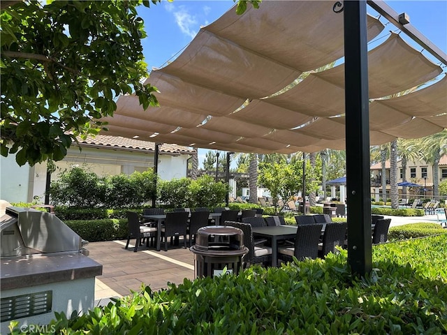 227 Carlow, Irvine, CA 92618 - view of patio with a pergola, outdoor dining space, and an outdoor kitchen