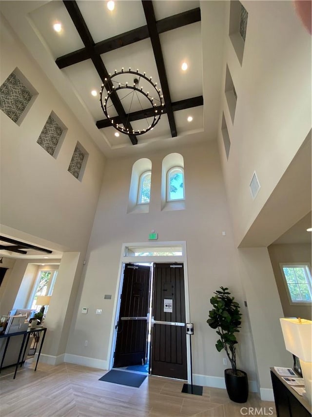 227 Carlow, Irvine, CA 92618 - entrance foyer featuring a high ceiling, coffered ceiling, a chandelier, healthy amount of natural light, and recessed lighting