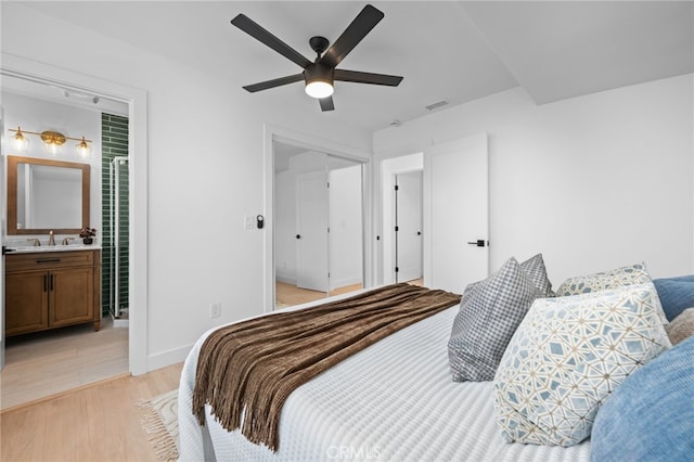 676 Alvin St, San Diego, CA 92114 - bedroom with light wood finished floors, connected bathroom, and a ceiling fan