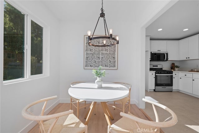 676 Alvin St, San Diego, CA 92114 - dining space with a chandelier and recessed lighting