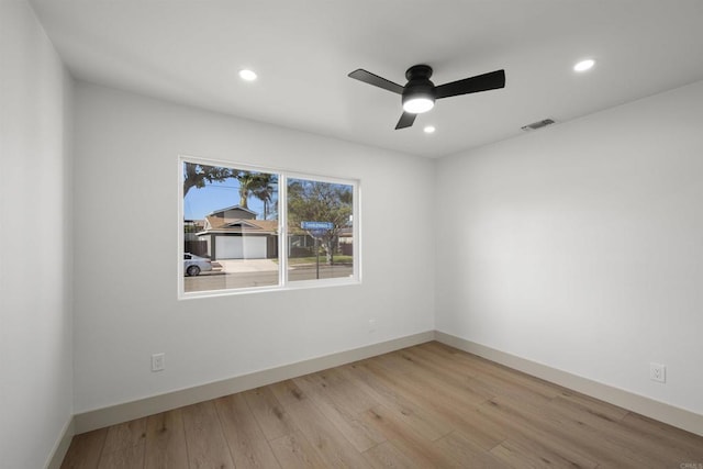6863 Tanglewood Rd, San Diego, CA 92111 - spare room featuring wood finished floors, a ceiling fan, and recessed lighting