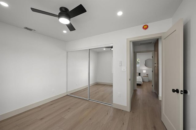 6863 Tanglewood Rd, San Diego, CA 92111 - unfurnished bedroom featuring light wood-style flooring, recessed lighting, a closet, and a ceiling fan
