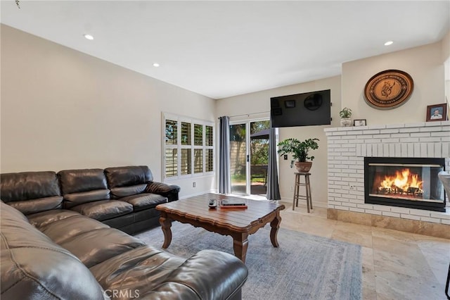15736 Milne Cir, Moorpark, CA 93021 - living area featuring a brick fireplace and recessed lighting