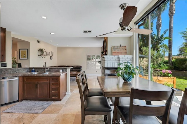 15736 Milne Cir, Moorpark, CA 93021 - dining area with plenty of natural light, a ceiling fan, recessed lighting, and a fireplace