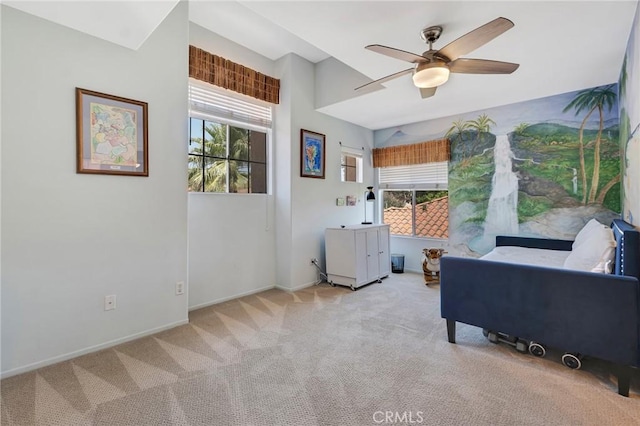 15736 Milne Cir, Moorpark, CA 93021 - living area featuring carpet floors, plenty of natural light, and a ceiling fan