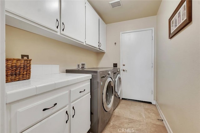 15736 Milne Cir, Moorpark, CA 93021 - washroom featuring cabinet space and separate washer and dryer