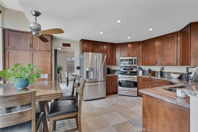 15736 Milne Cir, Moorpark, CA 93021 - kitchen with stainless steel appliances, a ceiling fan, recessed lighting, and light countertops