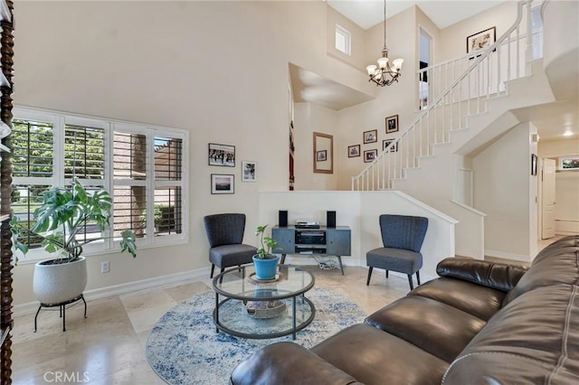 15736 Milne Cir, Moorpark, CA 93021 - living area featuring a towering ceiling, stairs, and a chandelier
