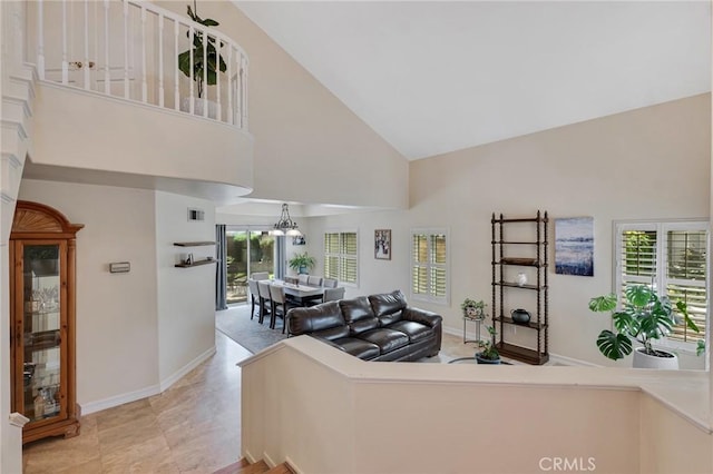 15736 Milne Cir, Moorpark, CA 93021 - living area with high vaulted ceiling and a chandelier