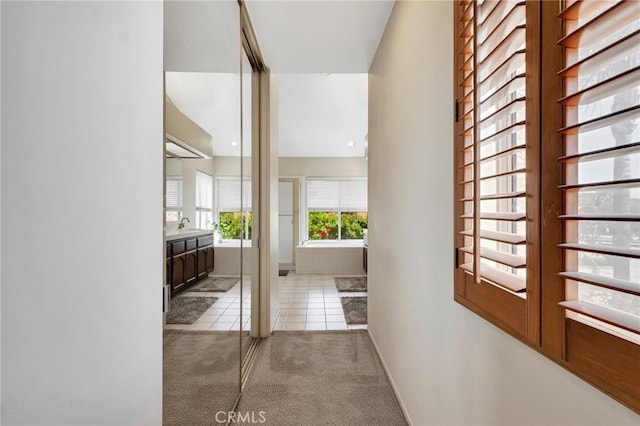 15736 Milne Cir, Moorpark, CA 93021 - hall with carpet floors and tile patterned flooring