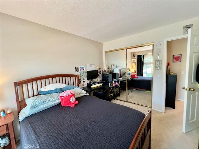 27347 Sahara Pl, Laguna Niguel, CA 92677 - bedroom with carpet flooring, a closet, and a textured ceiling