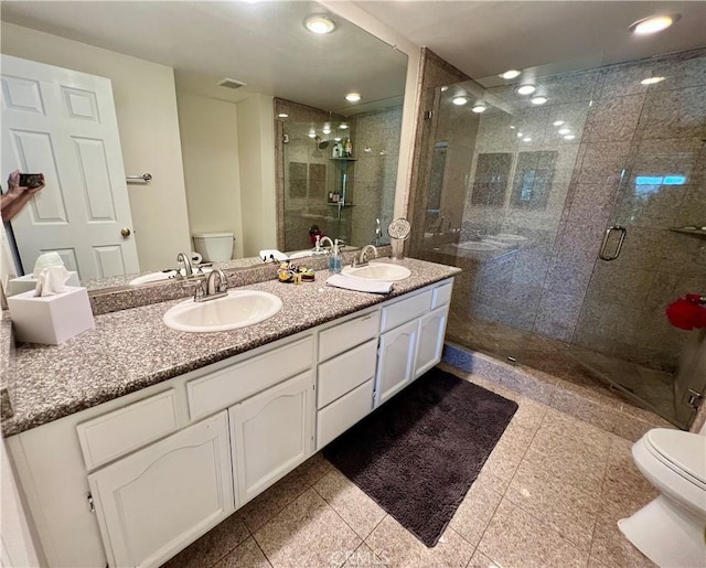 27347 Sahara Pl, Laguna Niguel, CA 92677 - bathroom featuring double vanity, a stall shower, recessed lighting, and granite tiled floors