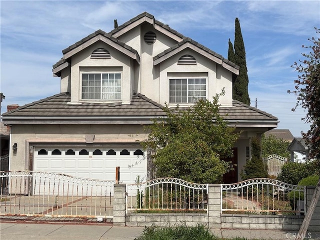 220 N Ynez Ave, Monterey Park, CA 91754 - view of front of house with stucco siding, an attached garage, a tile roof, and concrete driveway