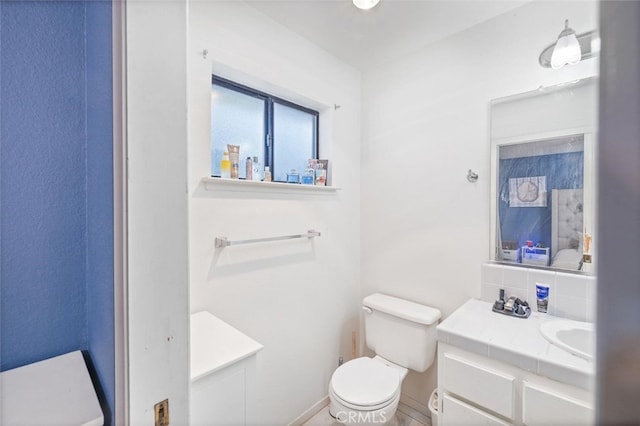 33030 Rd 233, North Fork, CA 93643 - bathroom with vanity and backsplash