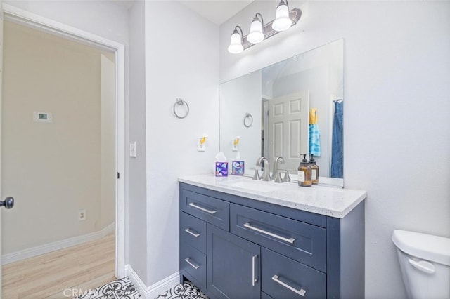 33030 Rd 233, North Fork, CA 93643 - bathroom featuring vanity and wood finished floors