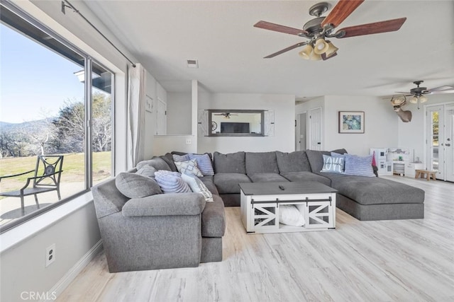 33030 Rd 233, North Fork, CA 93643 - living area with a ceiling fan and wood finished floors