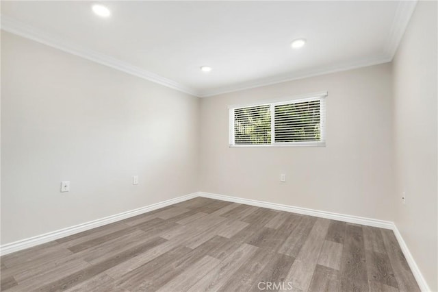 3034 Via Vis Unit A, Laguna Woods, CA 92637 - empty room with wood finished floors, ornamental molding, and recessed lighting