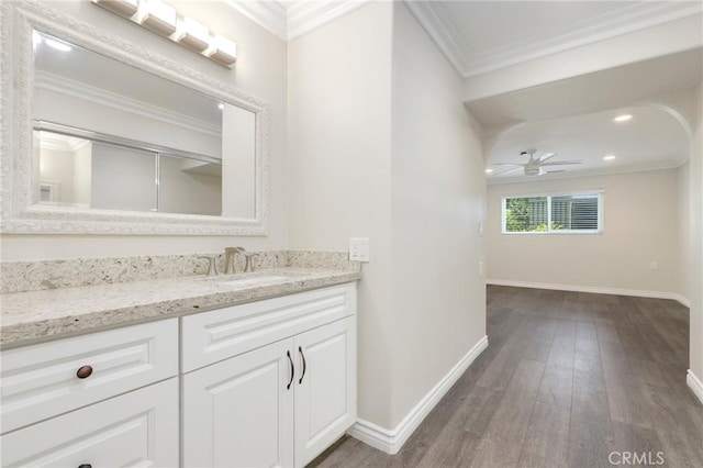 3034 Via Vis Unit A, Laguna Woods, CA 92637 - bathroom with vanity, ceiling fan, crown molding, wood finished floors, and recessed lighting