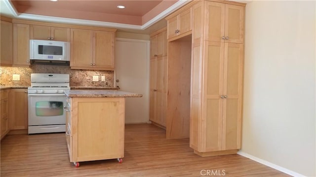 17305 Rosewood, Irvine, CA 92612 - kitchen featuring white appliances, light wood finished floors, backsplash, light brown cabinets, and recessed lighting