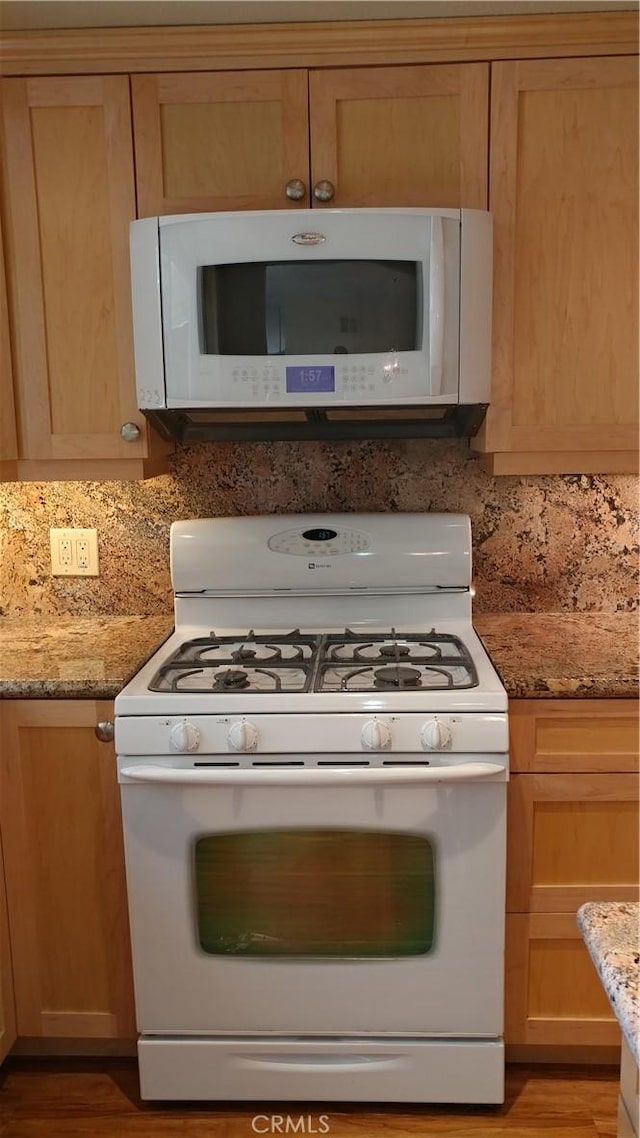 17305 Rosewood, Irvine, CA 92612 - kitchen with white appliances, light stone countertops, backsplash, and light wood-style flooring