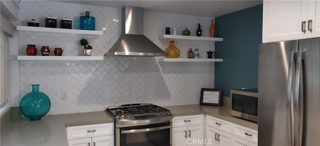 17305 Rosewood, Irvine, CA 92612 - kitchen with appliances with stainless steel finishes, open shelves, wall chimney range hood, tasteful backsplash, and white cabinets