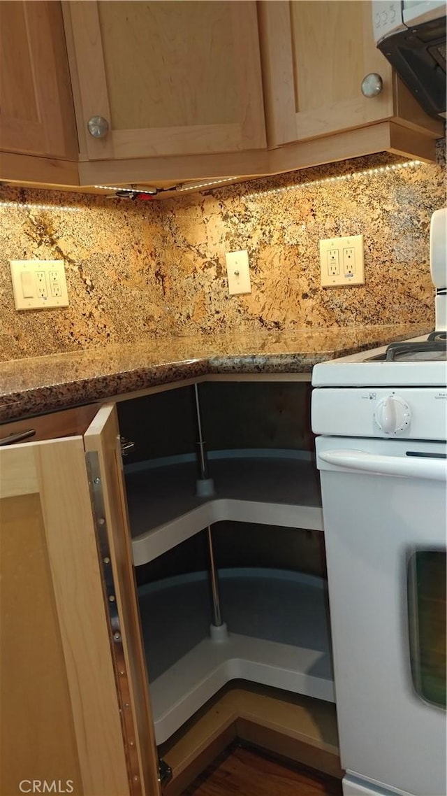 17305 Rosewood, Irvine, CA 92612 - kitchen view of gas range gas stove, light stone countertops, and ventilation hood