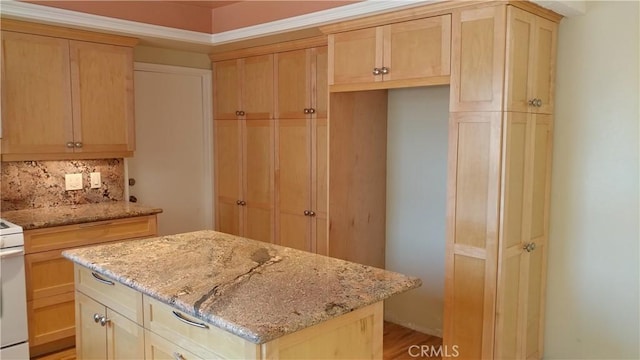 17305 Rosewood, Irvine, CA 92612 - kitchen with decorative backsplash, light stone counters, a center island, and light brown cabinetry
