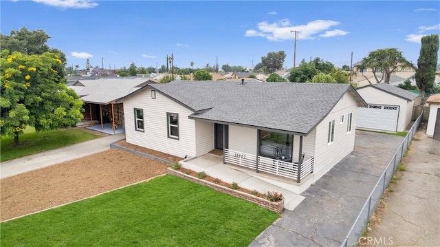 16627 E Greenhaven St, Covina, CA 91722 - view of front facade with covered porch, roof with shingles, a front yard, and a garage