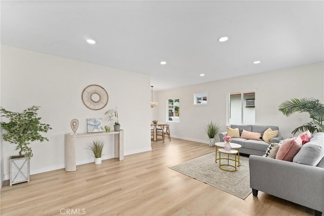 16627 E Greenhaven St, Covina, CA 91722 - living area with wood finished floors and recessed lighting