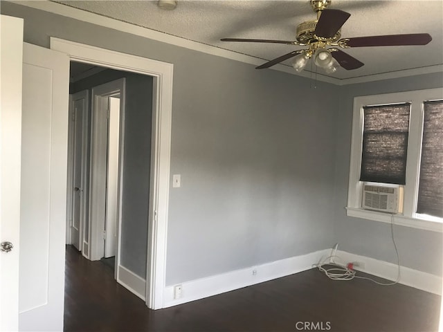 254 E Glenarm St, Pasadena, CA 91106 - empty room featuring dark wood-type flooring, ceiling fan, cooling unit, and a textured ceiling