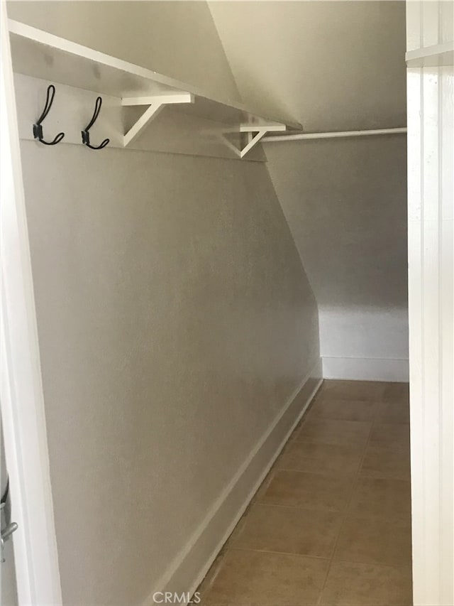 254 E Glenarm St, Pasadena, CA 91106 - spacious closet with light tile patterned floors and vaulted ceiling