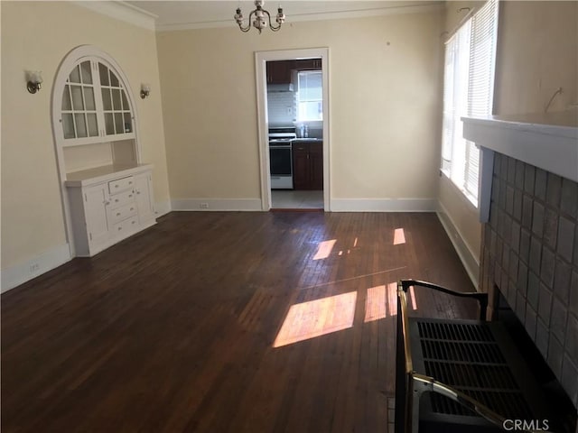 254 E Glenarm St, Pasadena, CA 91106 - unfurnished dining area featuring ornamental molding, dark wood-style floors, and a chandelier