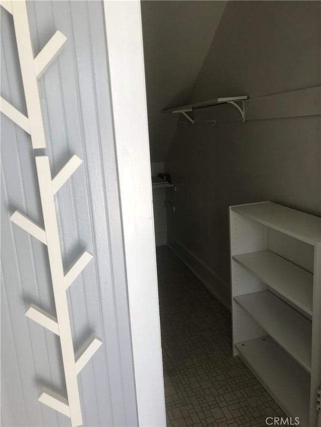 254 E Glenarm St, Pasadena, CA 91106 - spacious closet with tile patterned floors and lofted ceiling