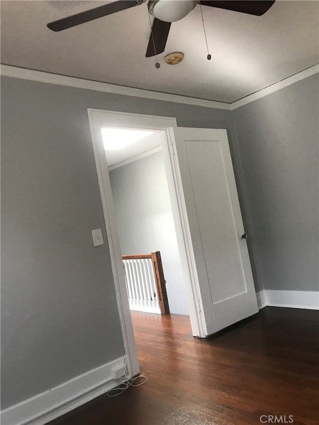 254 E Glenarm St, Pasadena, CA 91106 - spare room featuring ornamental molding, dark wood finished floors, a ceiling fan, and a smoke detector
