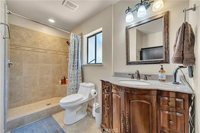 2528 Key Ct, Lancaster, CA 93536 - bathroom featuring vanity, a tile shower, and tile patterned floors