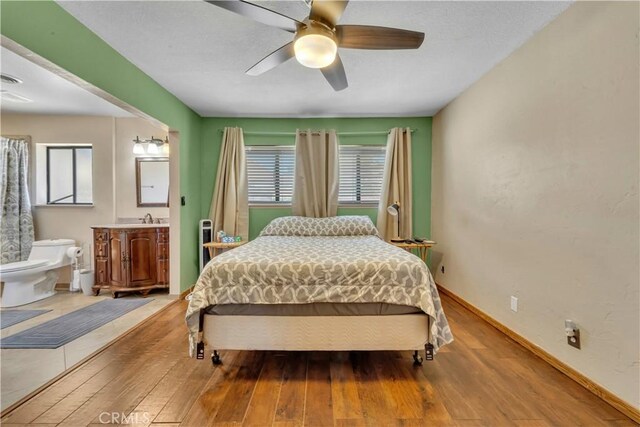 2528 Key Ct, Lancaster, CA 93536 - bedroom with wood finished floors and ceiling fan