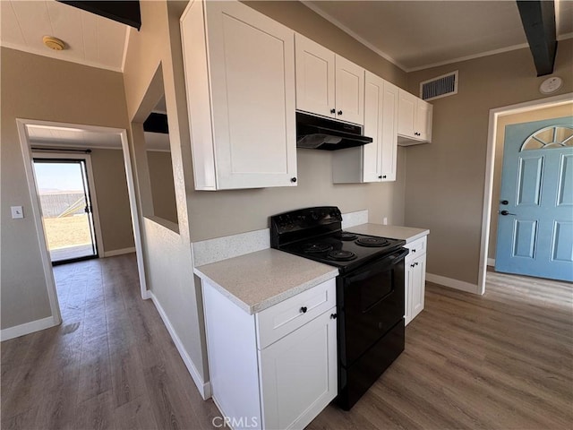 541 Frances Dr, Barstow, CA 92311 - kitchen featuring black / electric stove, under cabinet range hood, wood finished floors, white cabinets, and light countertops
