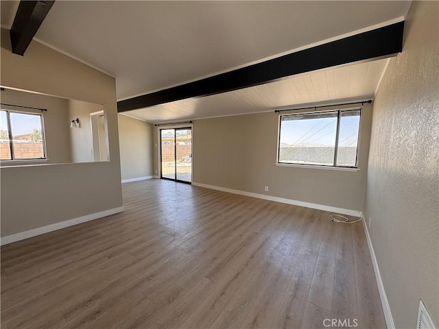 541 Frances Dr, Barstow, CA 92311 - empty room with wood finished floors and plenty of natural light