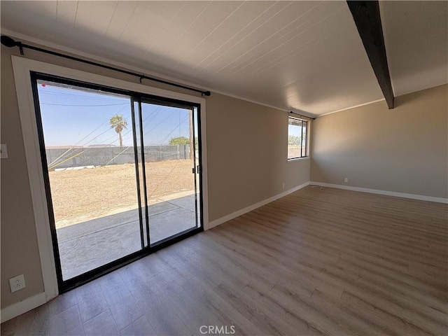 541 Frances Dr, Barstow, CA 92311 - unfurnished room with wood finished floors and baseboards