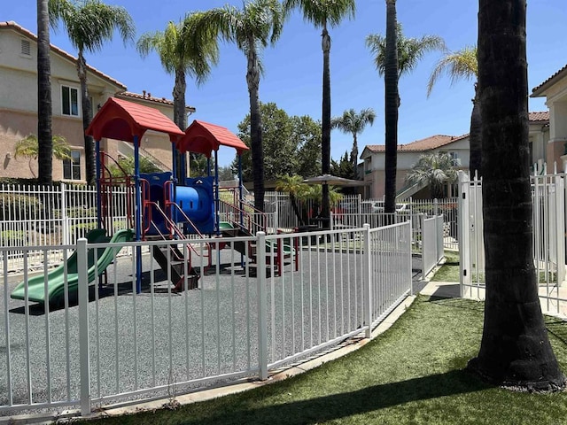 11422 Via Rancho San Diego Unit 84, El Cajon, CA 92019 - communal playground featuring oil tank