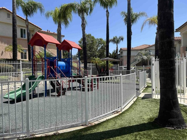 11422 Via Rancho San Diego Unit 84, El Cajon, CA 92019 - community playground featuring oil tank