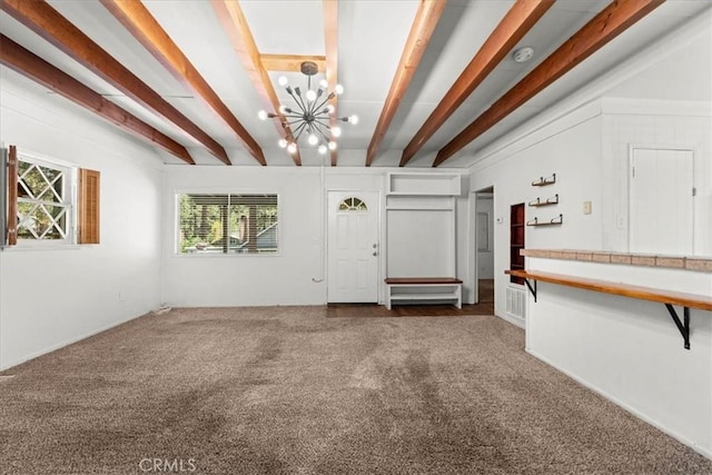 1869 Thrush Rd, Wrightwood, CA 92397 - unfurnished living room featuring a chandelier, carpet, and beamed ceiling