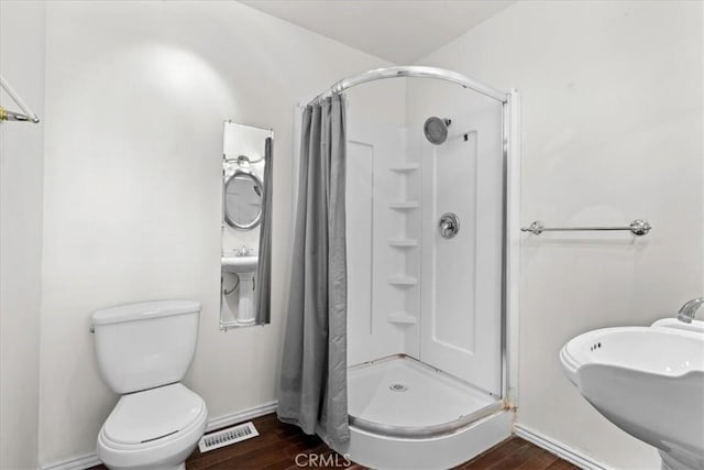 1869 Thrush Rd, Wrightwood, CA 92397 - bathroom featuring a stall shower and wood finished floors
